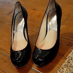 MICHAEL by Michael Kors, sexy, classic black patent platform heels.